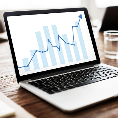 Laptop with Financial Charts